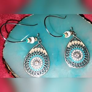 New pair of silver and bead dangle earrings.